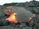 Lava breaks out from side of crusted flow, Kilauea volcano, Hawai`i